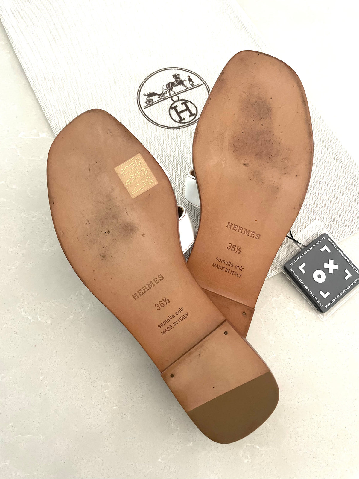 Hermès Oran sandals in white leather